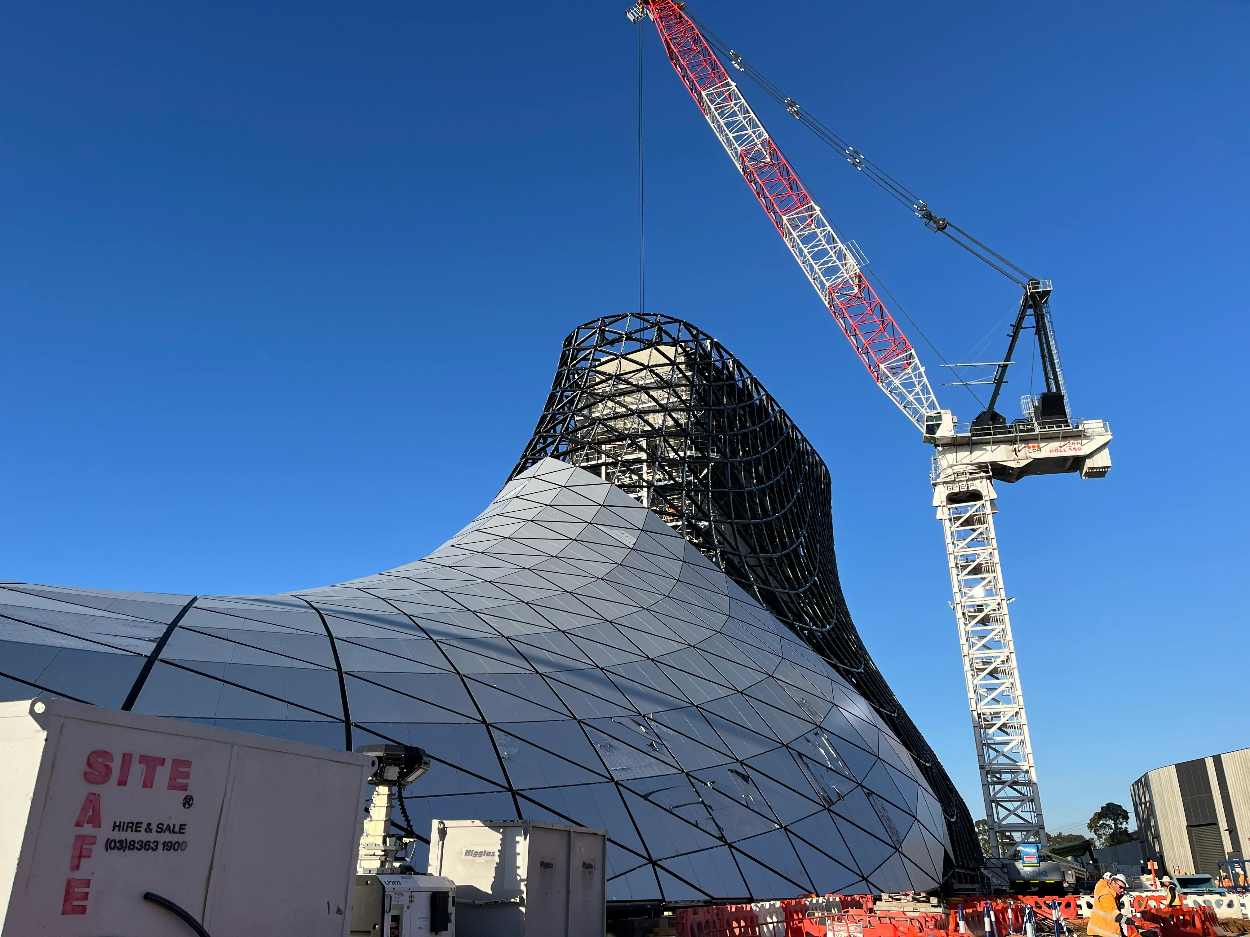 Crane erecting the steel portal canopy on the West Gate Tunnel Project