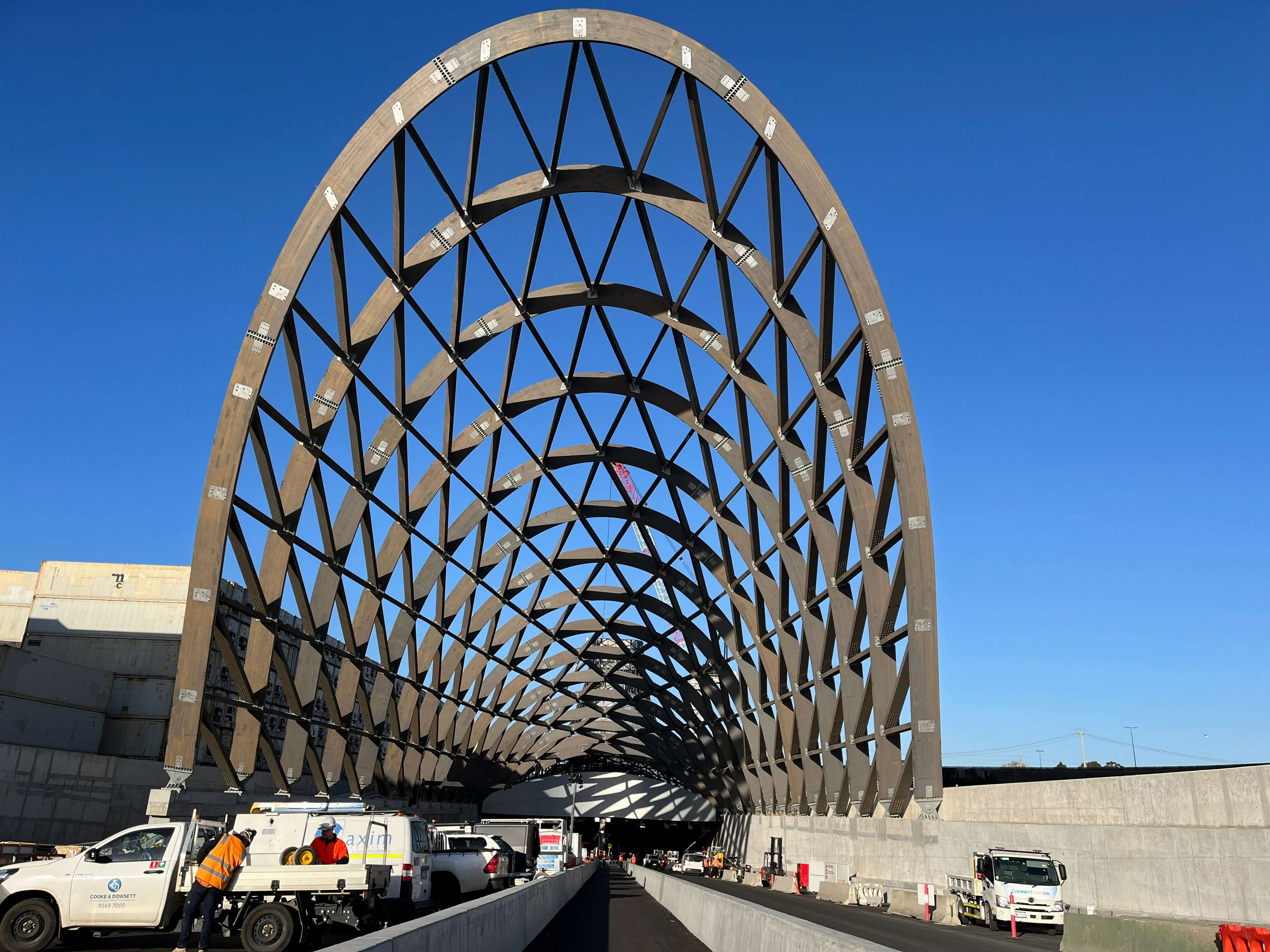 Completed steel arch portal over the West Gate Tunnel freeway ramps